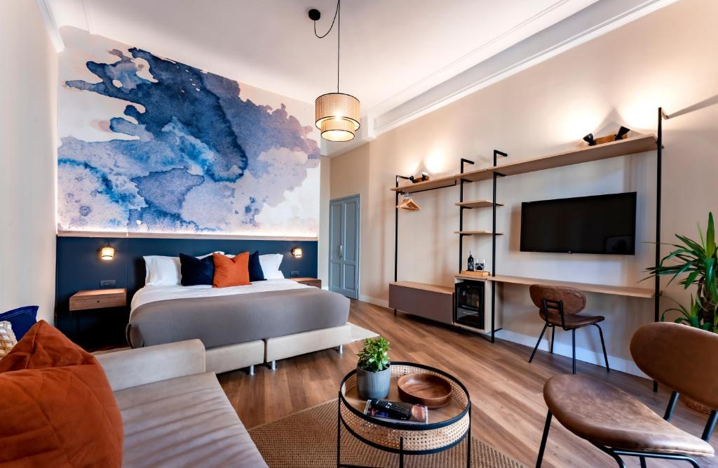 Habitación de hotel con cama y TV en Terra Artis Guest House, en Florencia