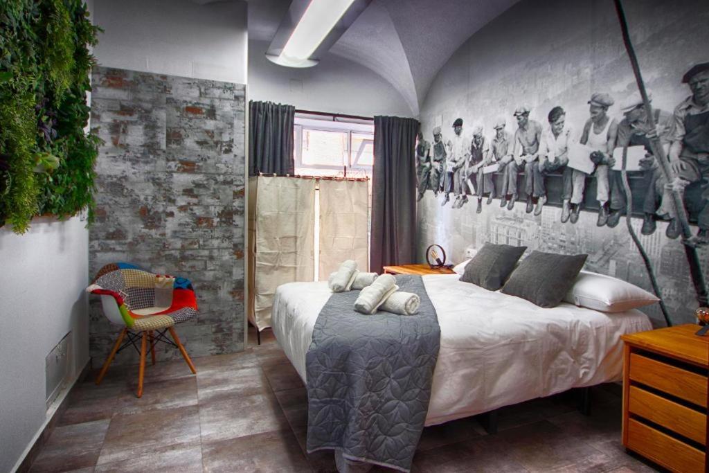 Postel nebo postele na pokoji v ubytování Apartamentos Gladiador