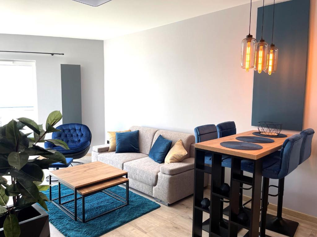 Posezení v ubytování APARTAMENT ELEGANCE BLUE w Let's Sea Basen&SPA