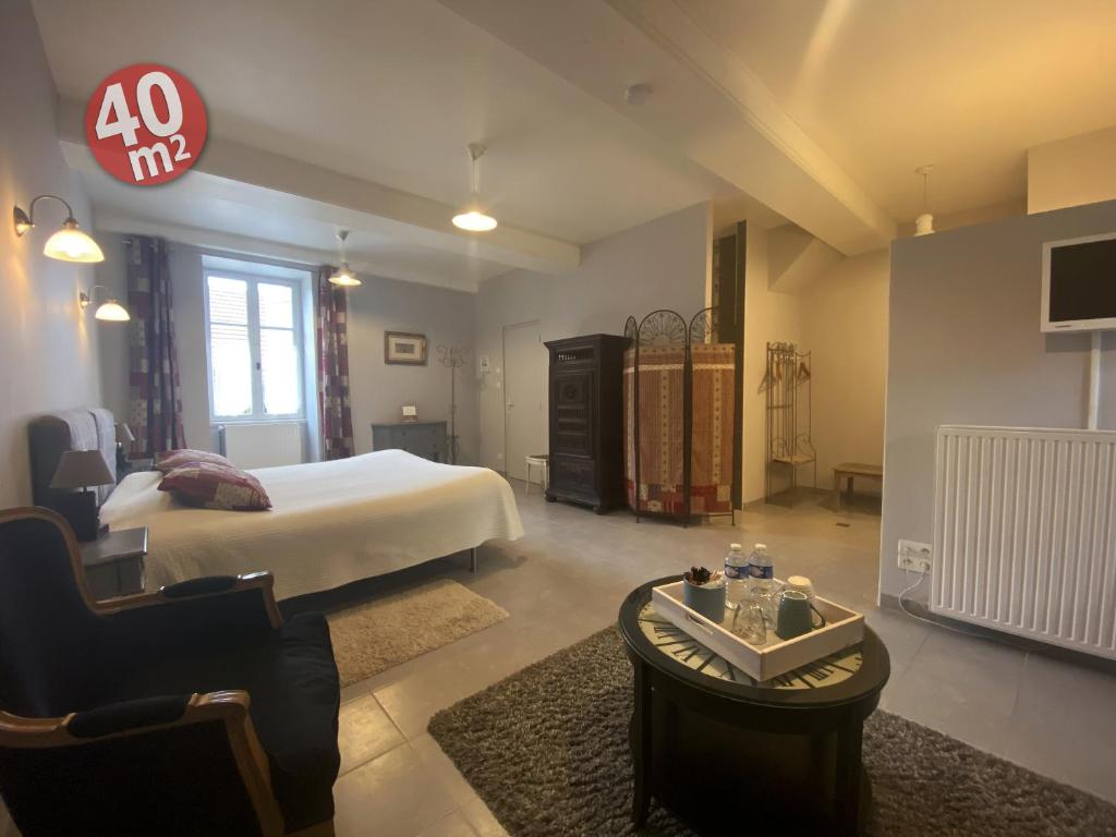 Postel nebo postele na pokoji v ubytování Domaine Les Bertrands
