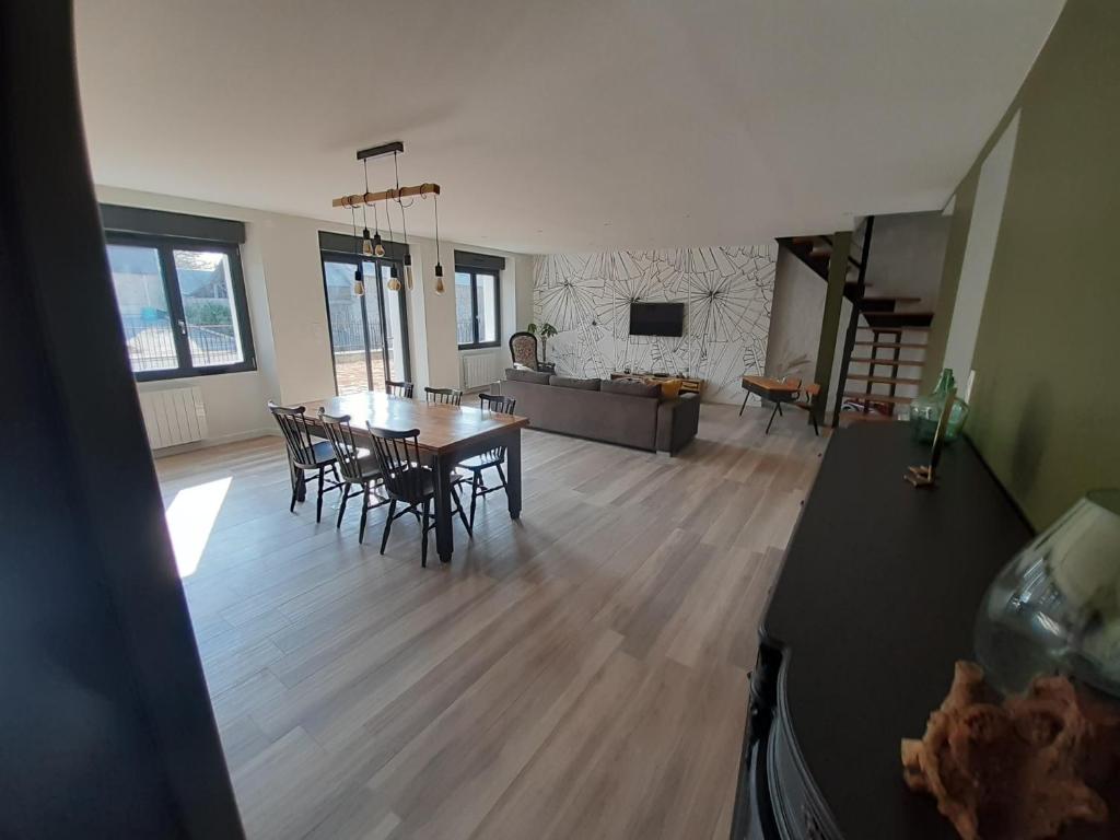 Posezení v ubytování Maison chaleureuse, spacieuse et familiale