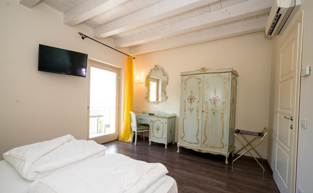 Postel nebo postele na pokoji v ubytování Hotel Pai