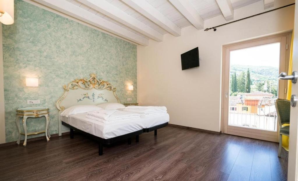 Postel nebo postele na pokoji v ubytování Hotel Pai