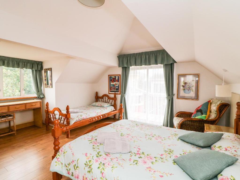 Postel nebo postele na pokoji v ubytování Ballysheen House