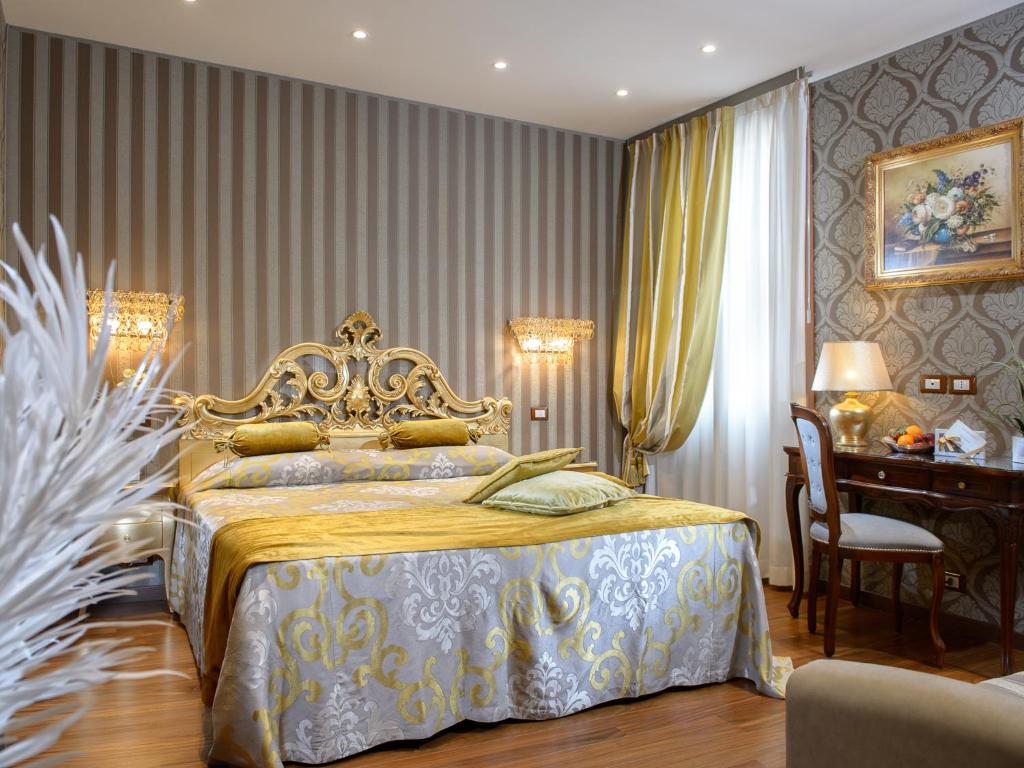 Postel nebo postele na pokoji v ubytování Hotel Santa Marina