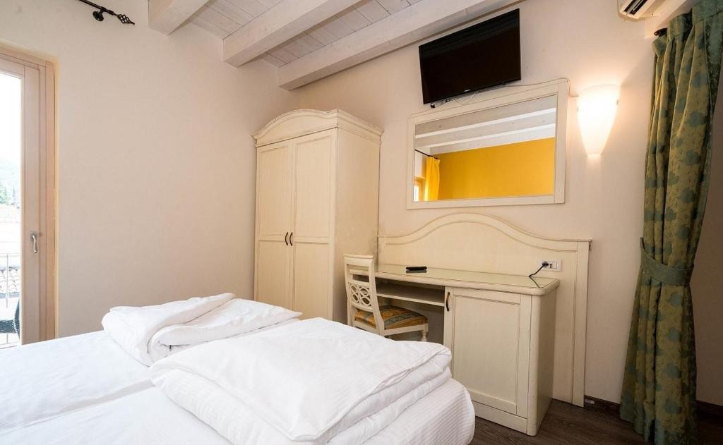 Postel nebo postele na pokoji v ubytování Hotel Pai