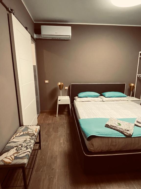 Postel nebo postele na pokoji v ubytování Affittacamere da Jasmina Venzone