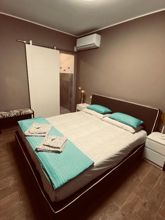Postel nebo postele na pokoji v ubytování Affittacamere da Jasmina Venzone