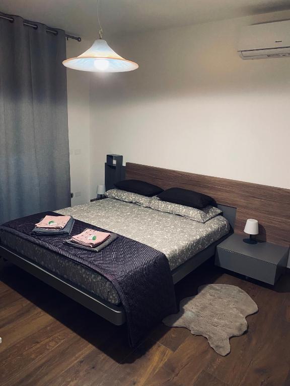 Postel nebo postele na pokoji v ubytování Affittacamere da Jasmina Venzone