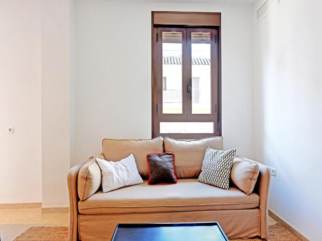 Posedenie v ubytovaní Apartamentos Santiago