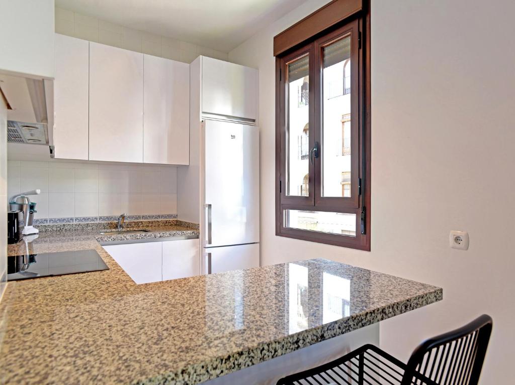 Kuchyňa alebo kuchynka v ubytovaní Apartamentos Santiago