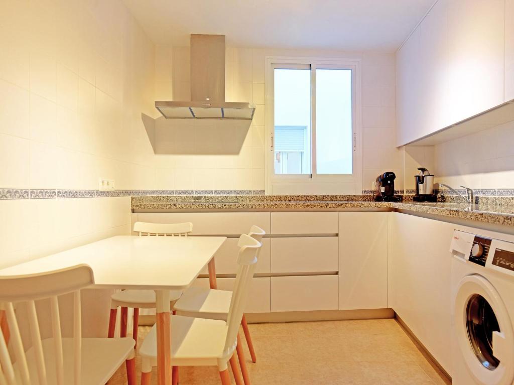 Kuchyňa alebo kuchynka v ubytovaní Apartamentos Santiago