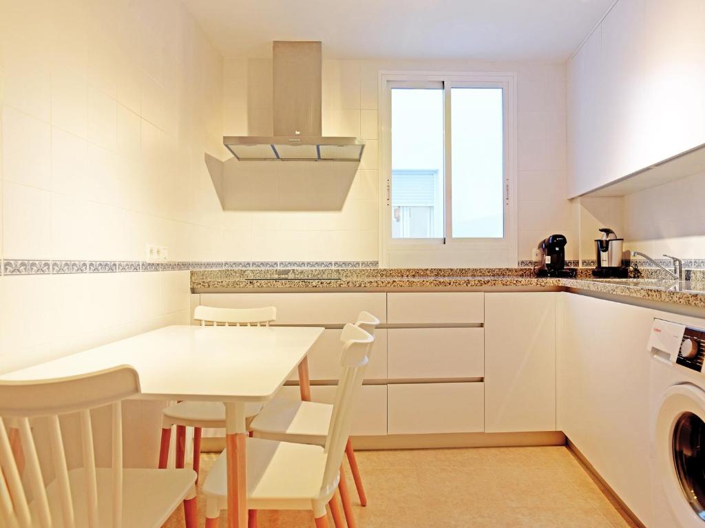Kuchyňa alebo kuchynka v ubytovaní Apartamentos Santiago