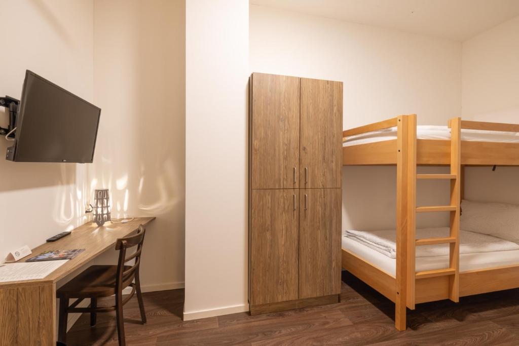 Postel nebo postele na pokoji v ubytování B&B Hotel Peter und Paul