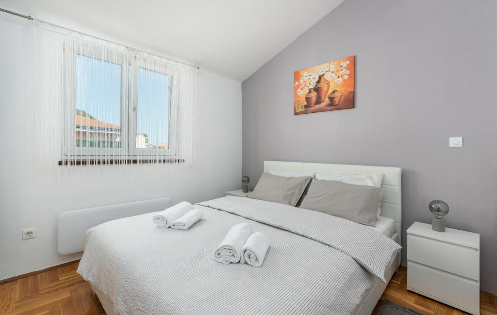 Postel nebo postele na pokoji v ubytování Apartment MIA