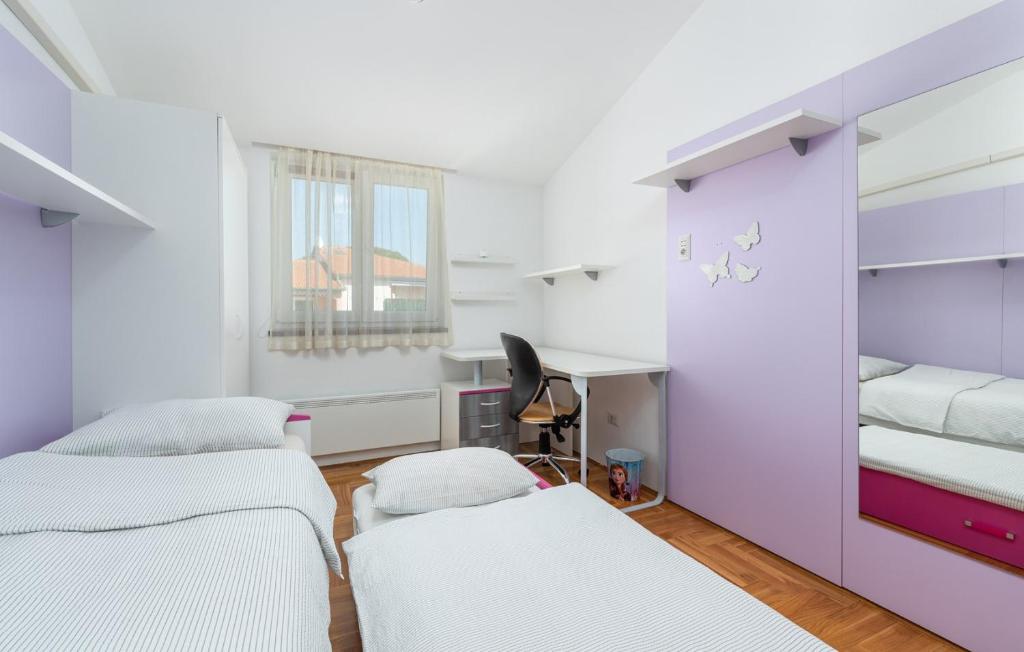 Postel nebo postele na pokoji v ubytování Apartment MIA
