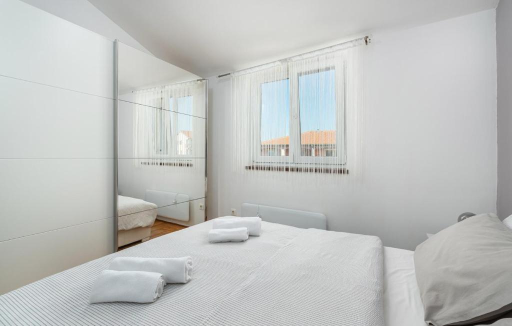Postel nebo postele na pokoji v ubytování Apartment MIA