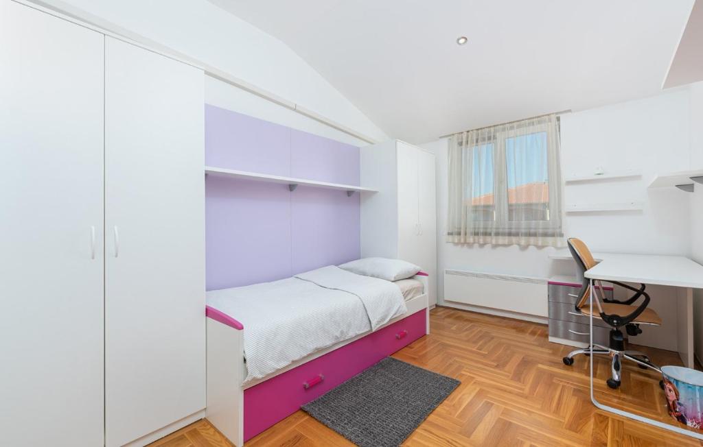 Postel nebo postele na pokoji v ubytování Apartment MIA