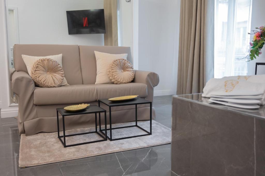 Televízia a/alebo spoločenská miestnosť v ubytovaní NM Luxury Suites