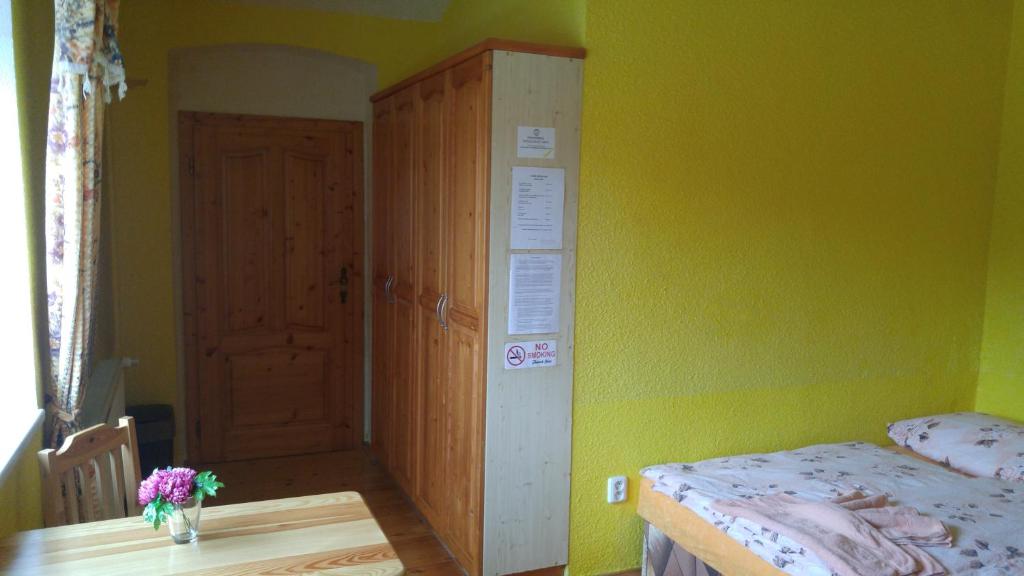Postel nebo postele na pokoji v ubytování Penzion Apartmány Bečov