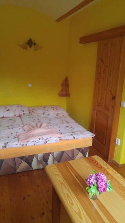 Postel nebo postele na pokoji v ubytování Penzion Apartmány Bečov