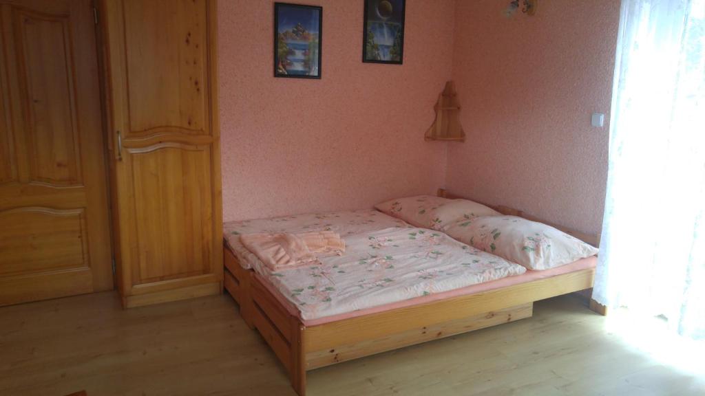 Postel nebo postele na pokoji v ubytování Penzion Apartmány Bečov