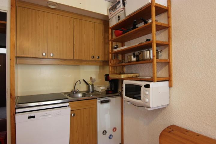 Kuchyň nebo kuchyňský kout v ubytování Hauts De Vanoise Appartements VTI