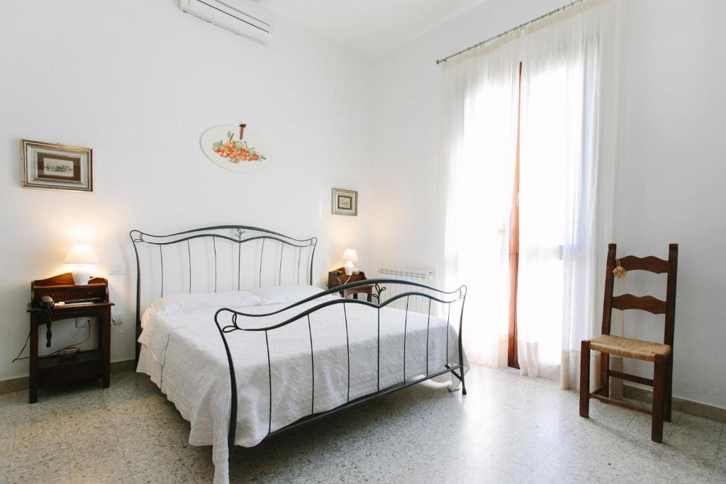 Postel nebo postele na pokoji v ubytování Country Hotel Vessus