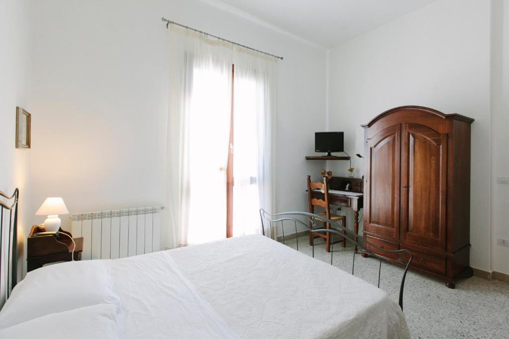 Postel nebo postele na pokoji v ubytování Country Hotel Vessus