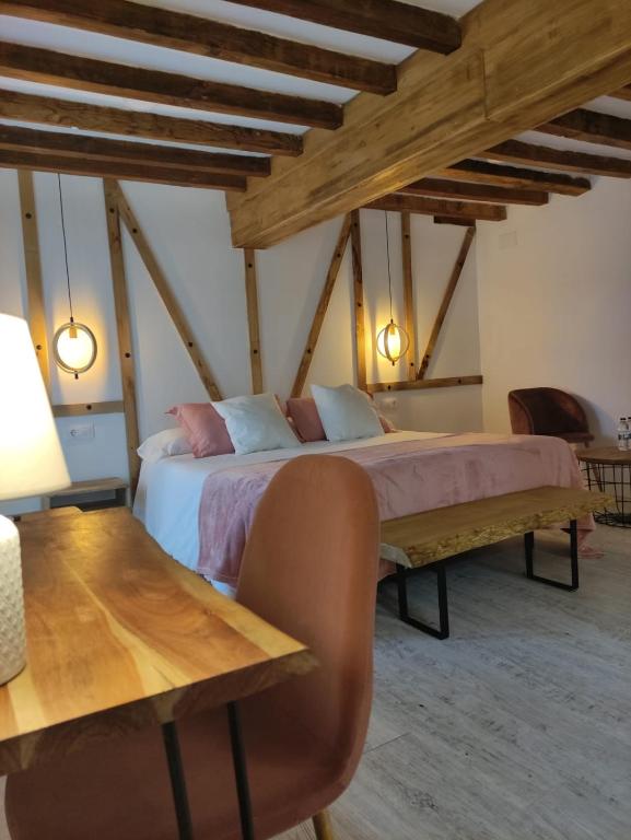 Postel nebo postele na pokoji v ubytování Casa Rural el Rincón de Monfragüe