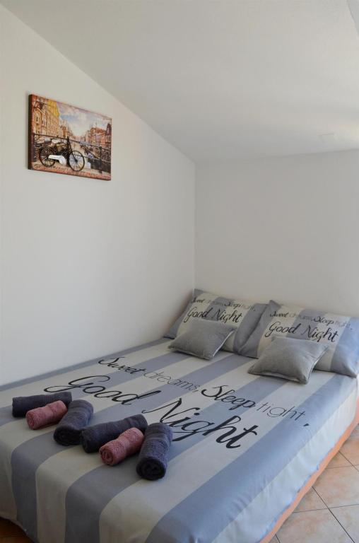 Postel nebo postele na pokoji v ubytování Apartments Davorka