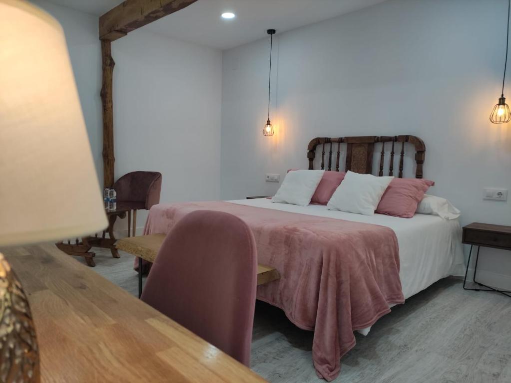 Postel nebo postele na pokoji v ubytování Casa Rural el Rincón de Monfragüe