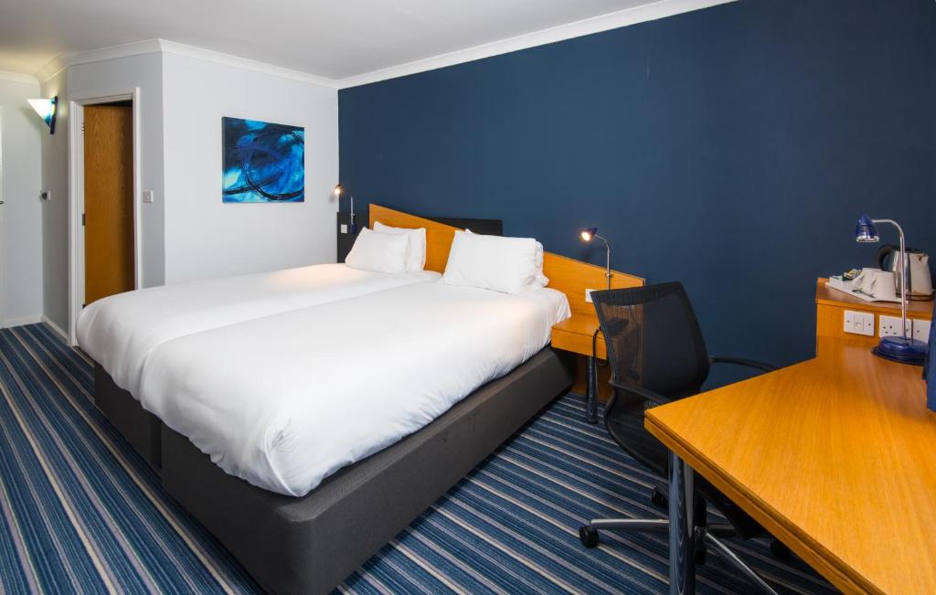 Postel nebo postele na pokoji v ubytování Holiday Inn Express Manchester East by IHG
