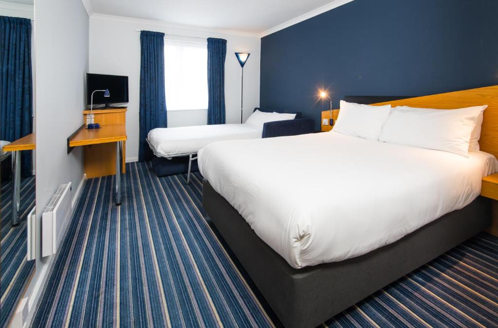 Postel nebo postele na pokoji v ubytování Holiday Inn Express Manchester East by IHG