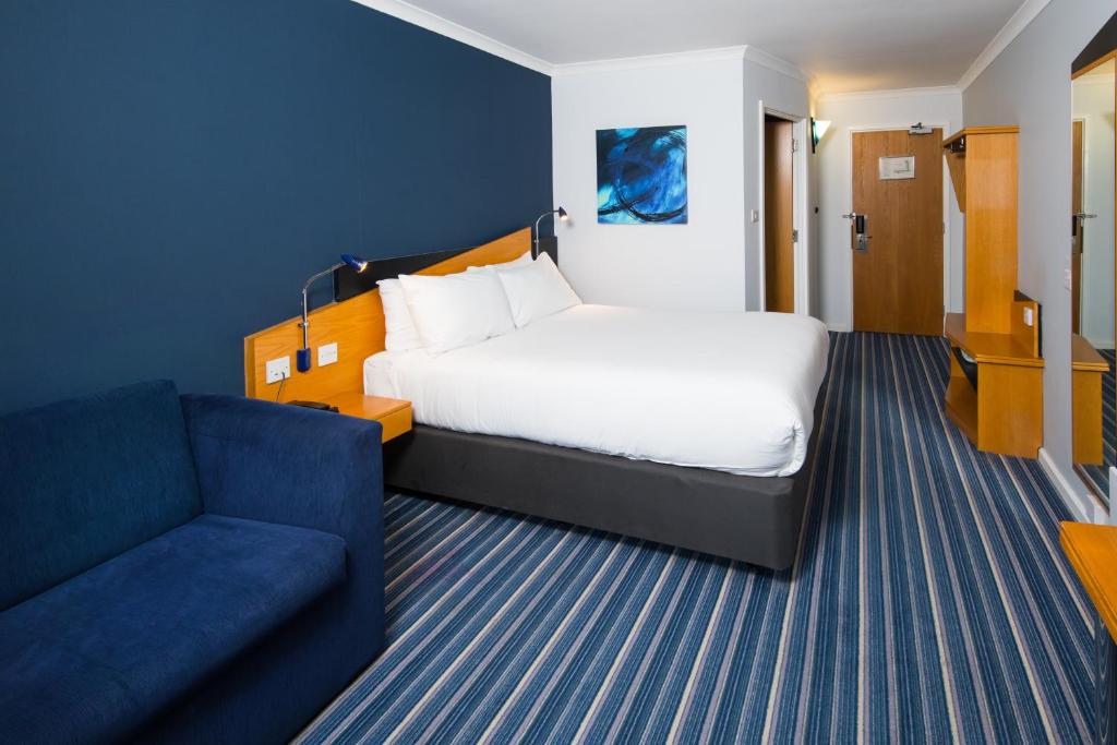 Postel nebo postele na pokoji v ubytování Holiday Inn Express Manchester East by IHG