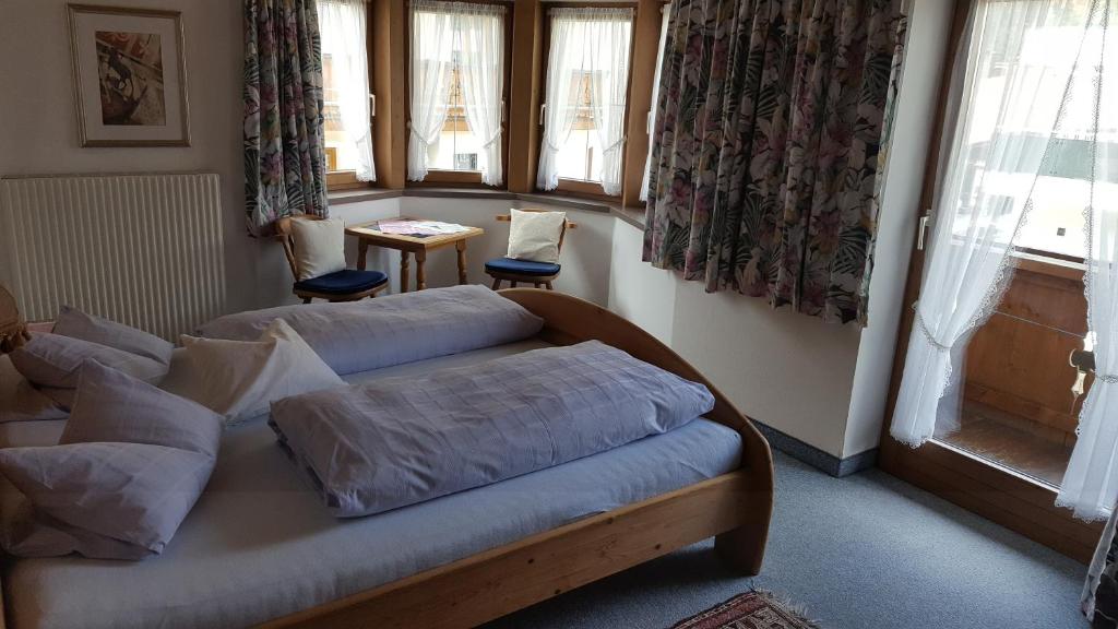 Postel nebo postele na pokoji v ubytování Gästehaus Valentina