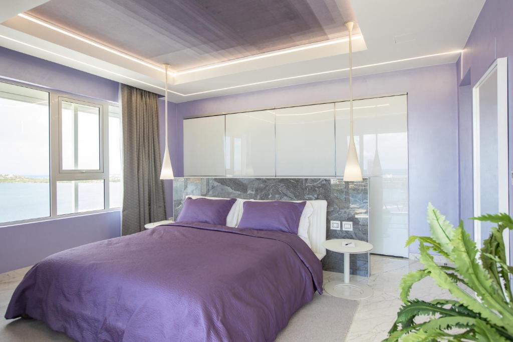 Postel nebo postele na pokoji v ubytování Serenity Penthouse