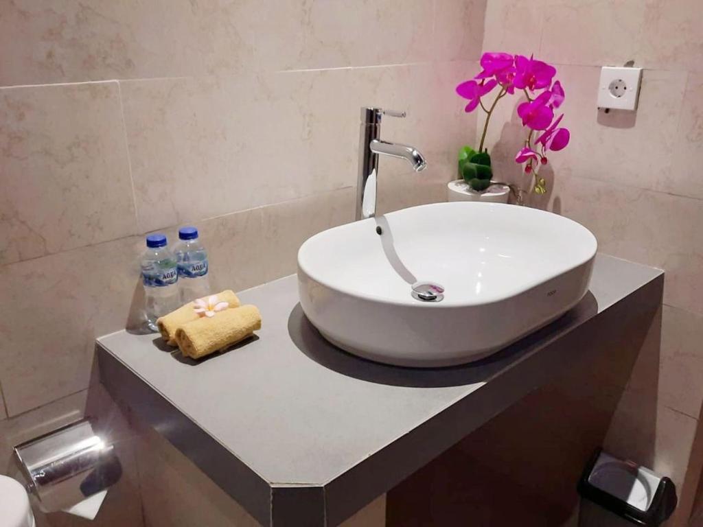Koupelna v ubytování Pulu Sari Suite Ubud