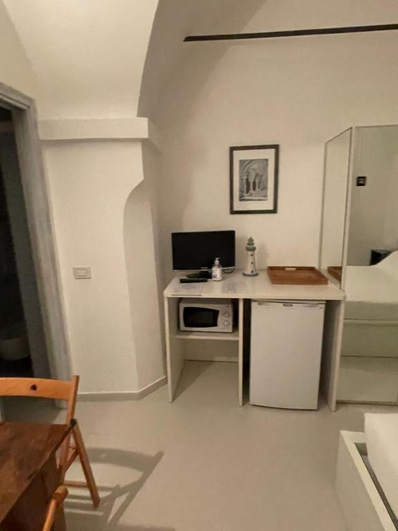Kuchyňa alebo kuchynka v ubytovaní La Casa di Alessia