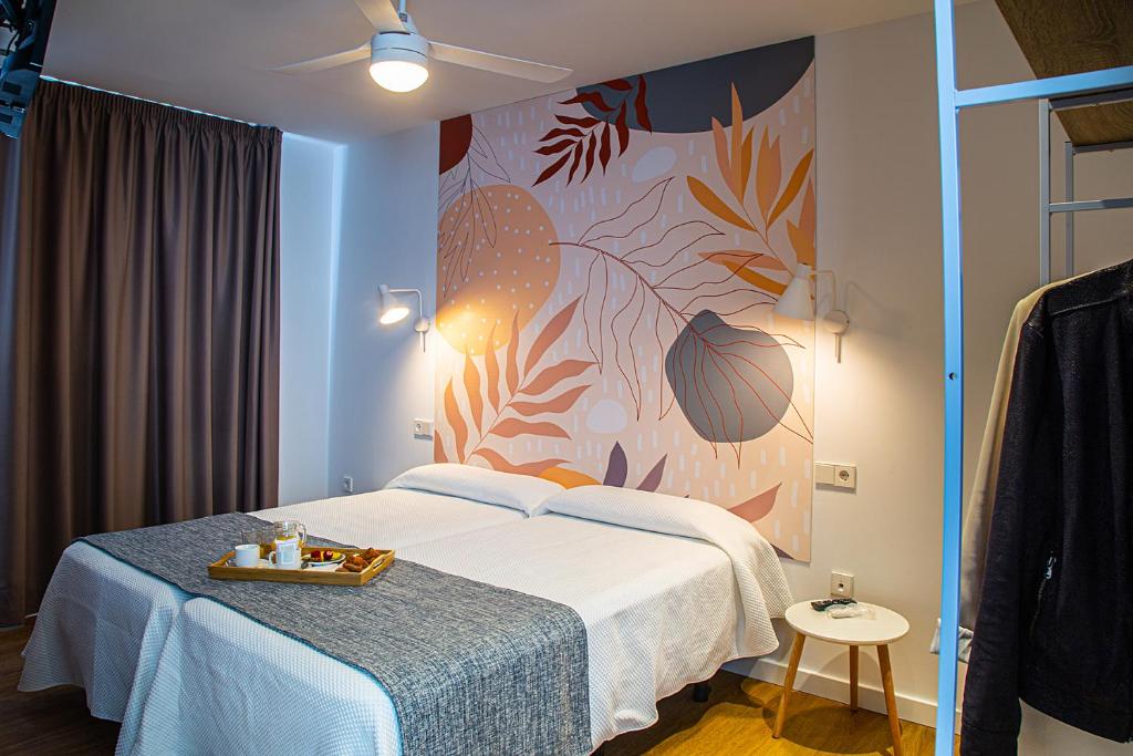 Postel nebo postele na pokoji v ubytování Hotel Internacional