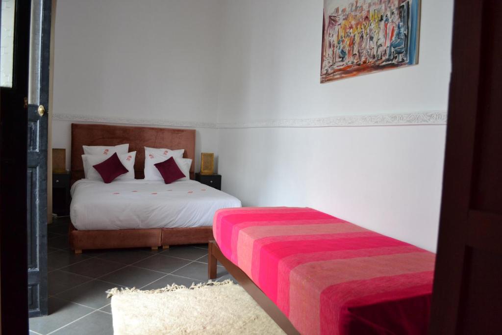 Letto o letti in una camera di Riad le Voile d'Orient