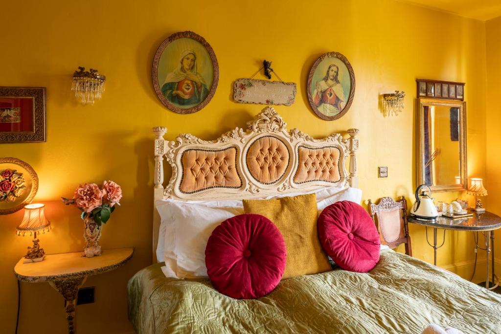 Postel nebo postele na pokoji v ubytování La Rosa Hotel