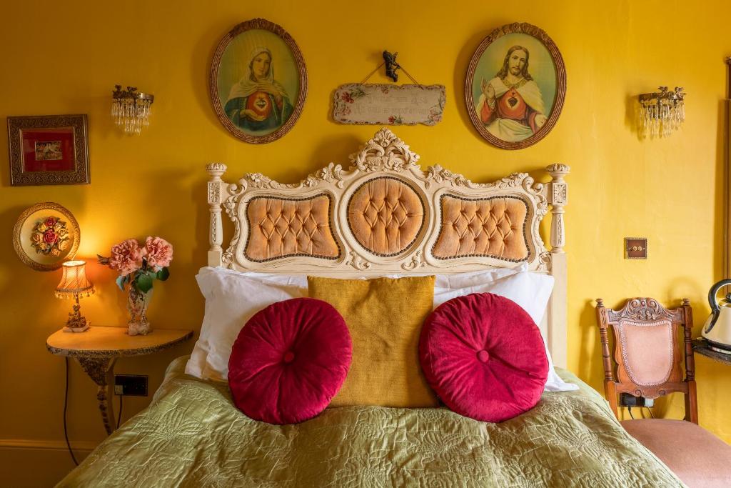 Postel nebo postele na pokoji v ubytování La Rosa Hotel