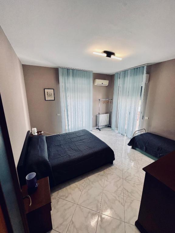 A bed or beds in a room at La casa del sole