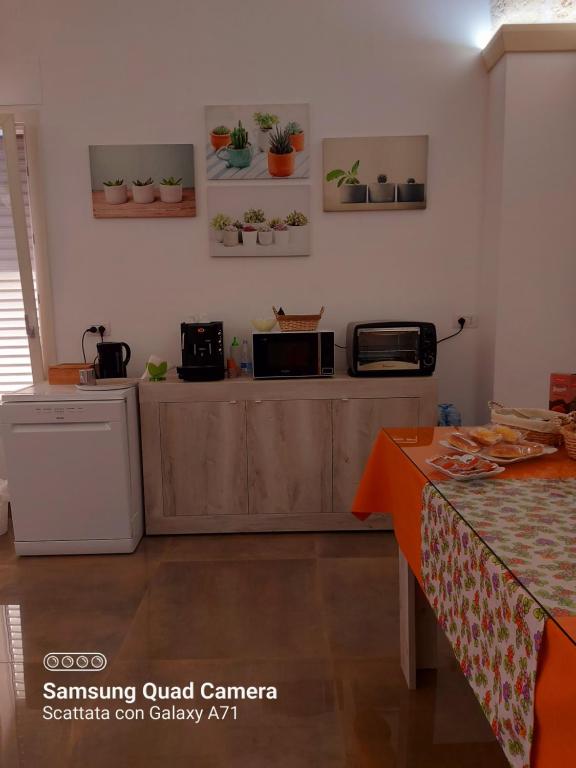 Kuchyň nebo kuchyňský kout v ubytování B&B Civico 11