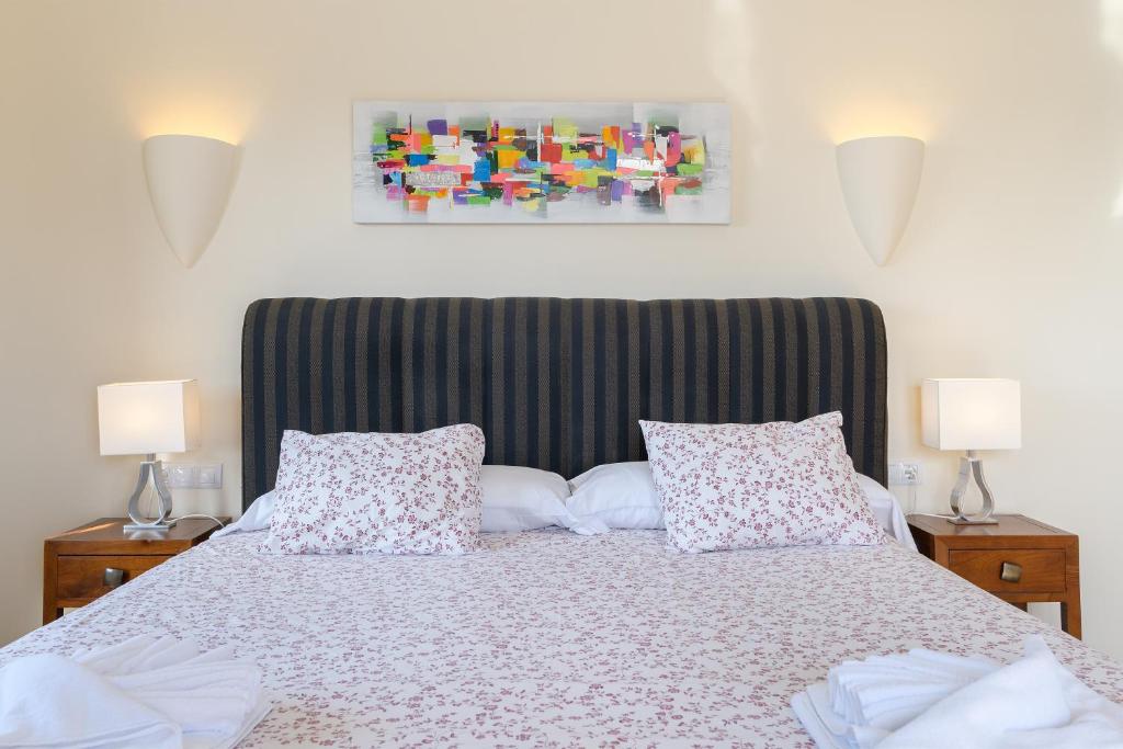 Postel nebo postele na pokoji v ubytování Hipoclub Villas, Aguamarina 27
