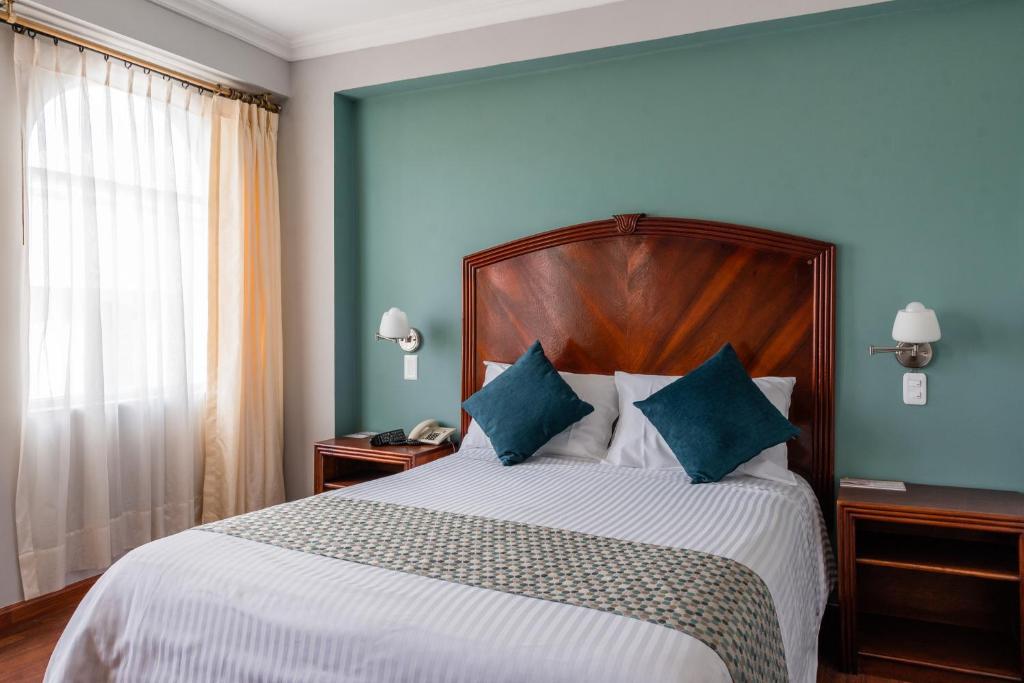 Postel nebo postele na pokoji v ubytování Hotel Libertador
