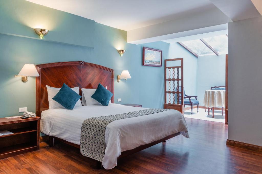 Postel nebo postele na pokoji v ubytování Hotel Libertador