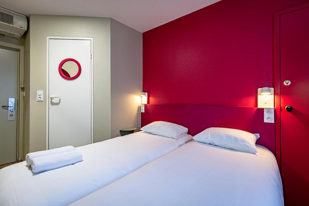 Postel nebo postele na pokoji v ubytování Vini Hotel