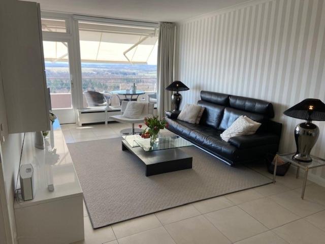 Posezení v ubytování Top - Apartment mit Aussicht